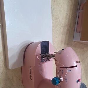Pink.  Sewing machine